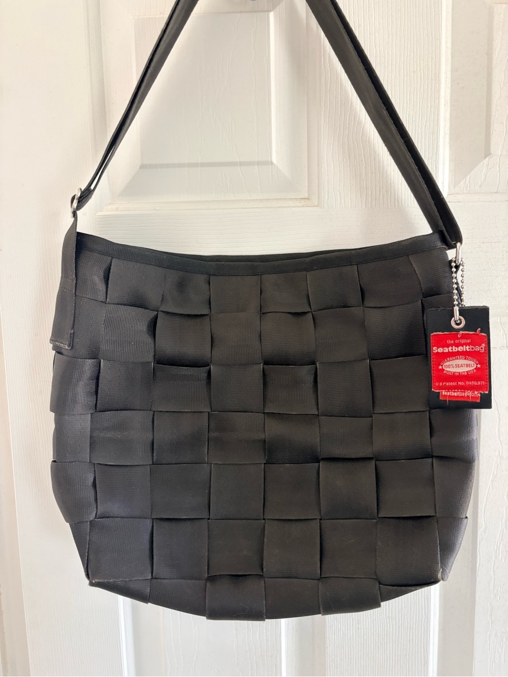 Black Woven seatbelt Shoulder Bag. 14x12